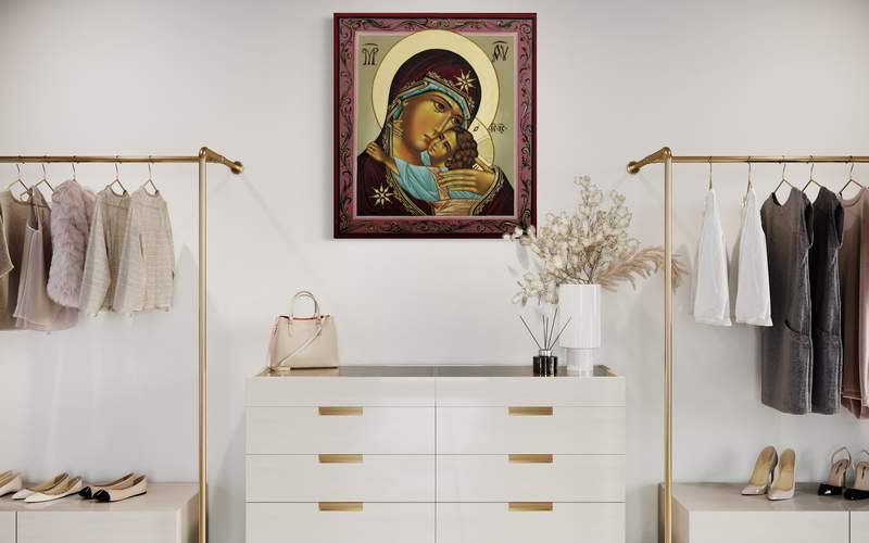 Icon of the Mother of God hanging in a clothing boutique