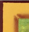 Detail of Lia Galdiolo's icon of the Father: the corner with the gilded frame and the red border