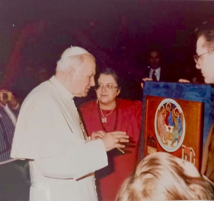 The Holy Family with the Trinity — Lia Galdiolo presents John Paul II with the icon of the Holy Family surmounted by the Rublev Trinity.